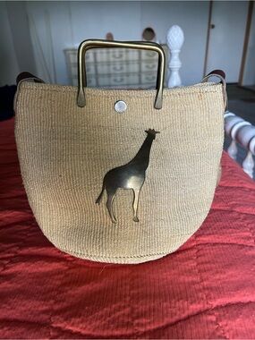 Woven Straw Crossbody Bag with Brass Giraffe Accent - Natural